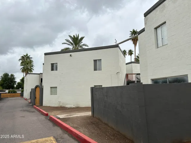 a view of a house with a street