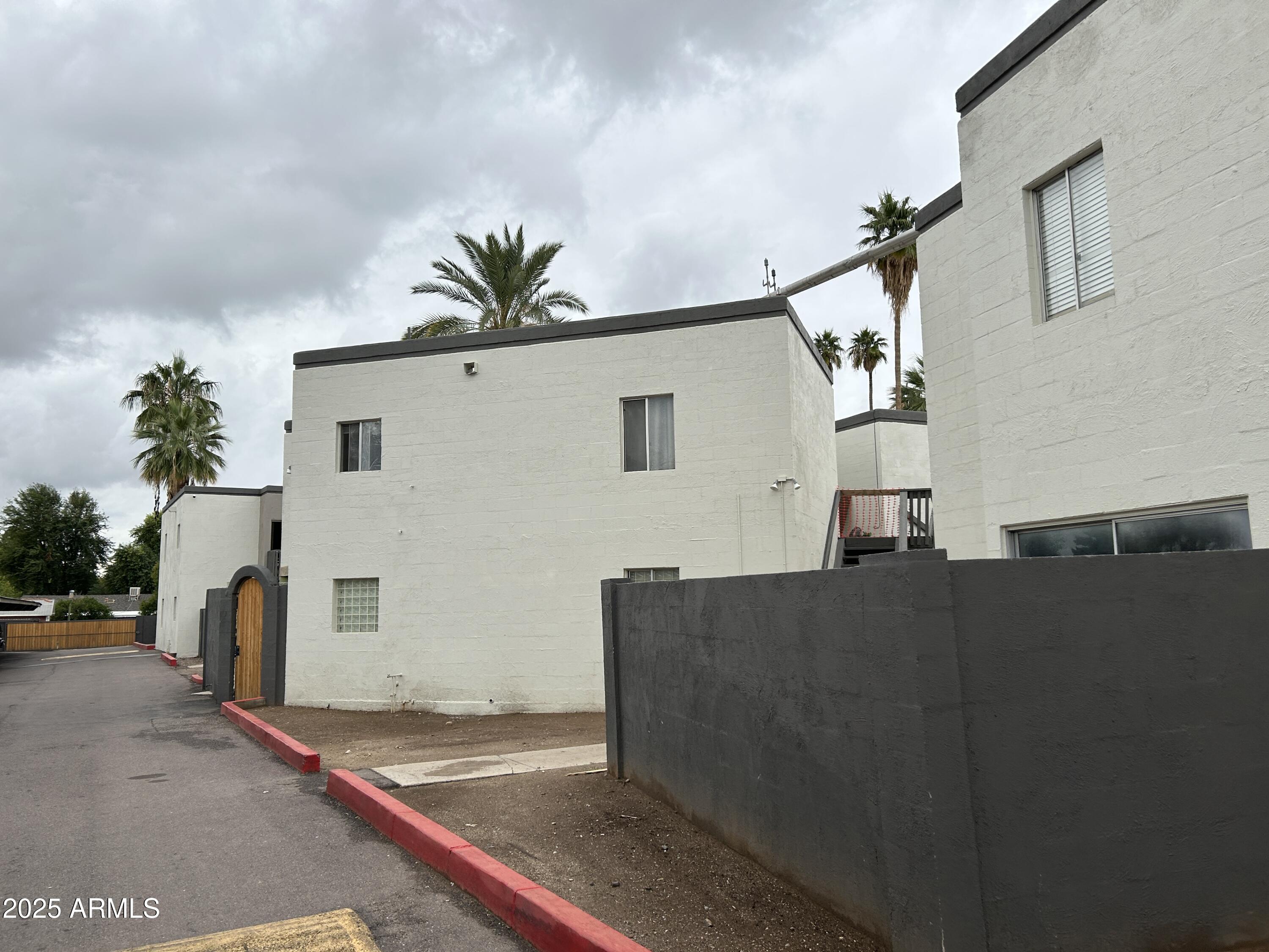 6236 North 16th Street, Unit 19 Phoenix, AZ 85016 - Photo 18 of 18 a view of a house with a street