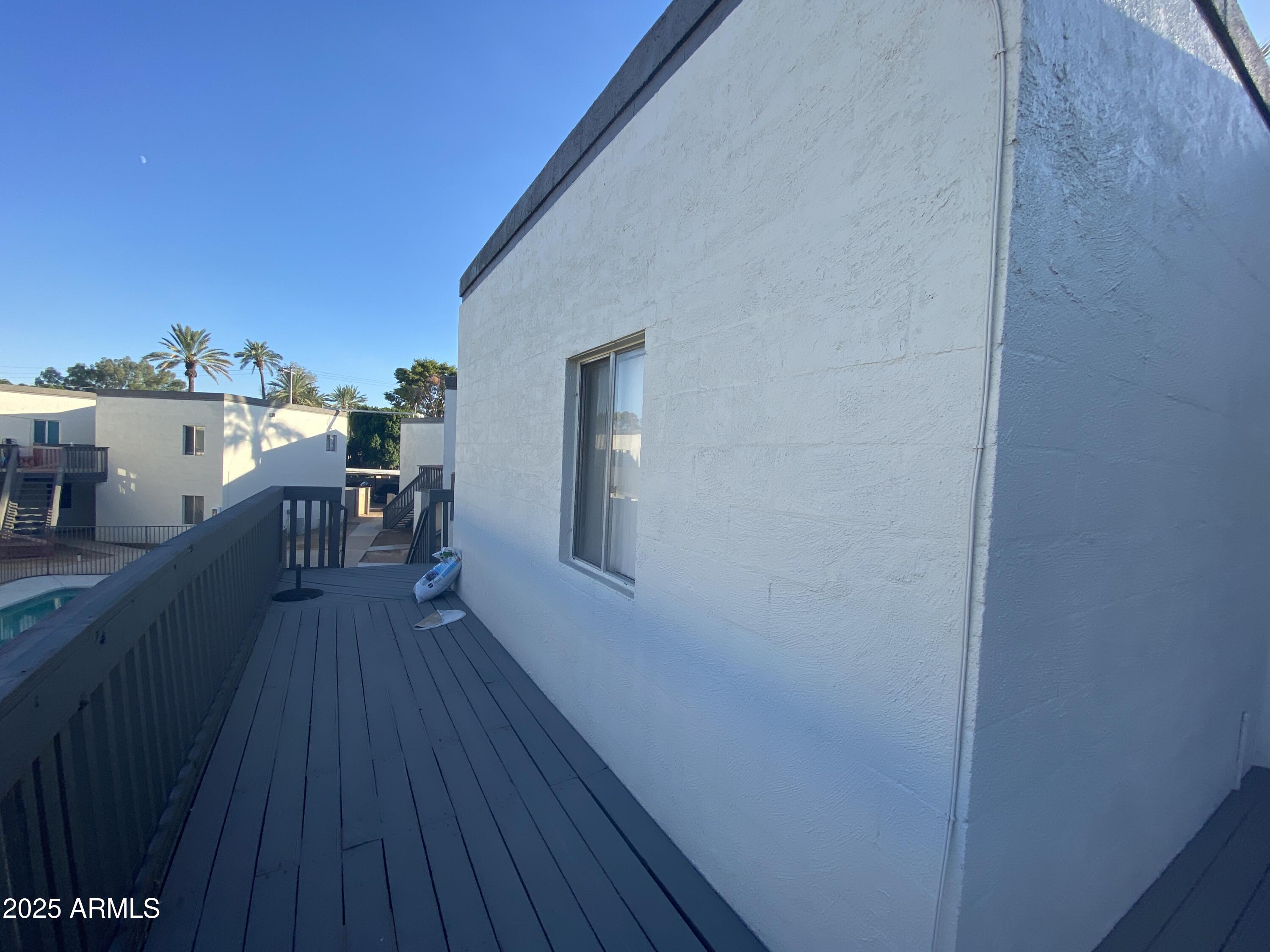 6236 North 16th Street, Unit 19 Phoenix, AZ 85016 - Photo 3 of 18 a view of a house with wooden floor