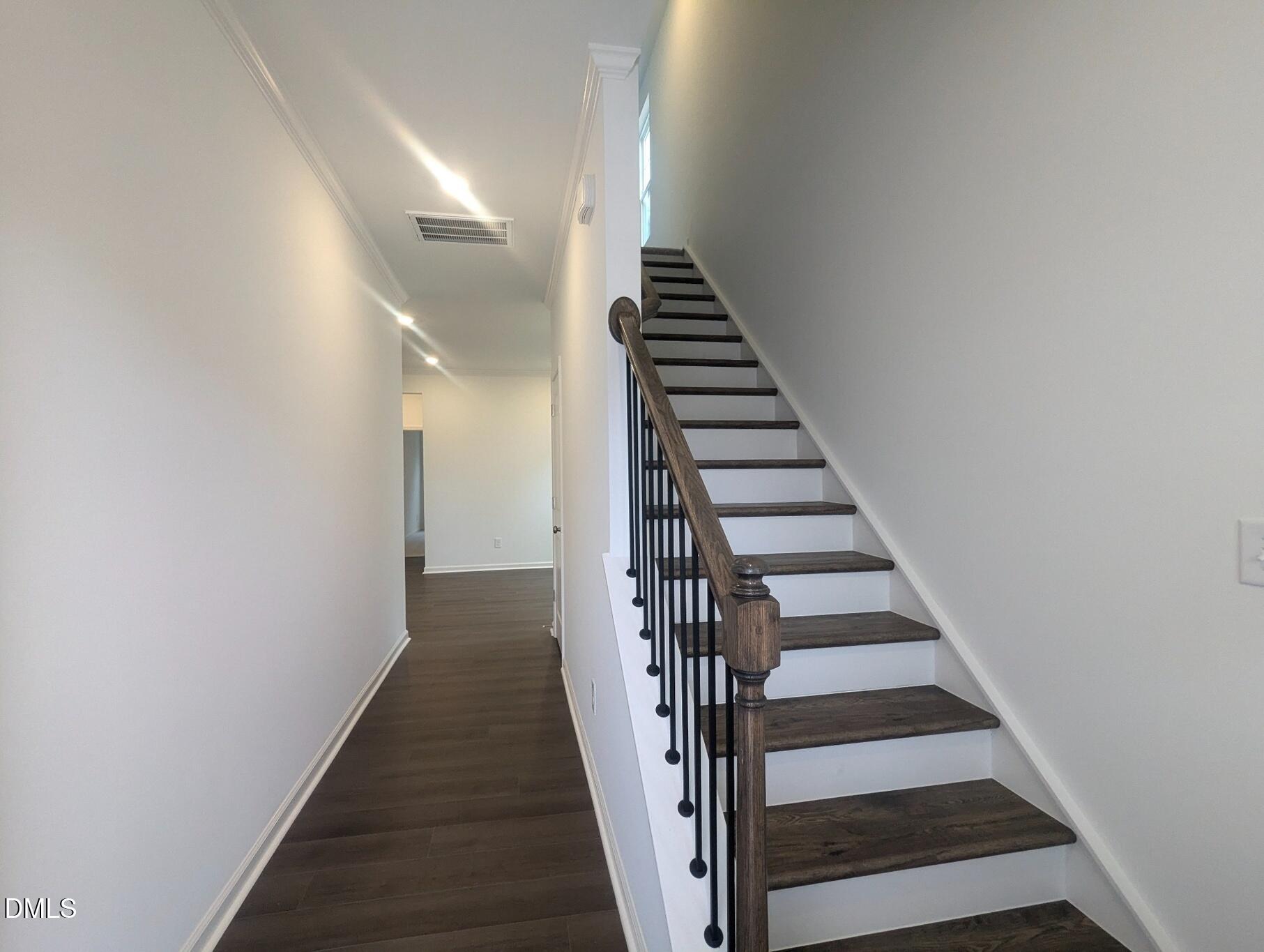 1000 Red Finch Way Angier, NC 27501 - Photo 2 of 31 a view of entryway and gallery with wooden floor