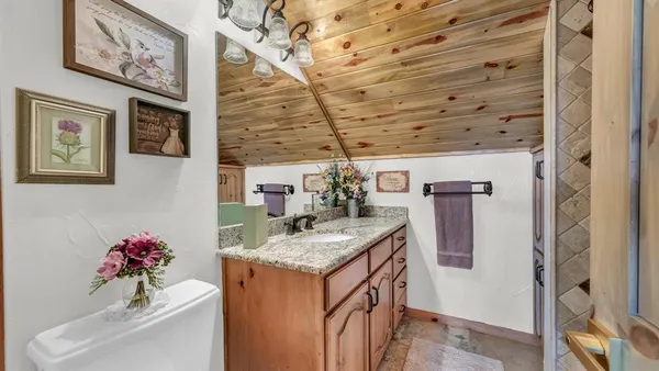a view of a chairs and table in the patio