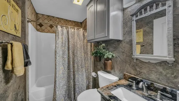 a view of a house with a porch