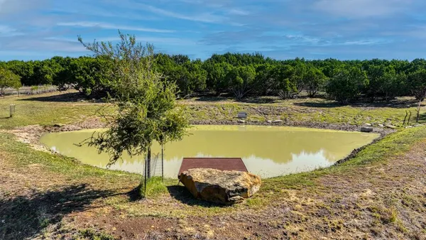 a view of swimming pool with a patio
