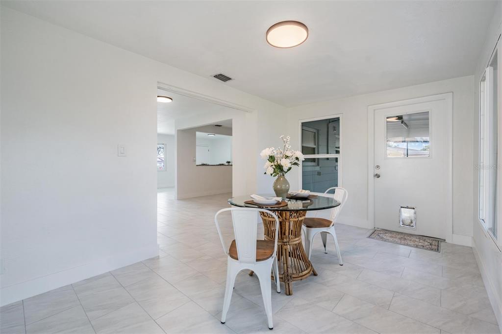 6472 113th Street Seminole, FL 33772 - Photo 22 of 36 a view of a workspace with furniture