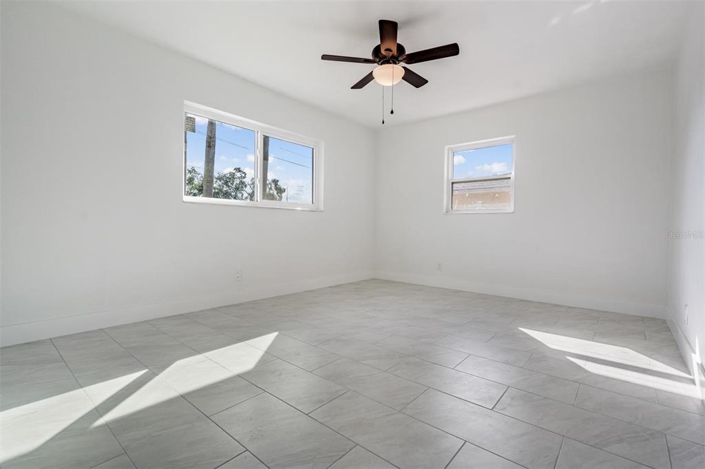 6472 113th Street Seminole, FL 33772 - Photo 28 of 36 a view of a big room with carpet