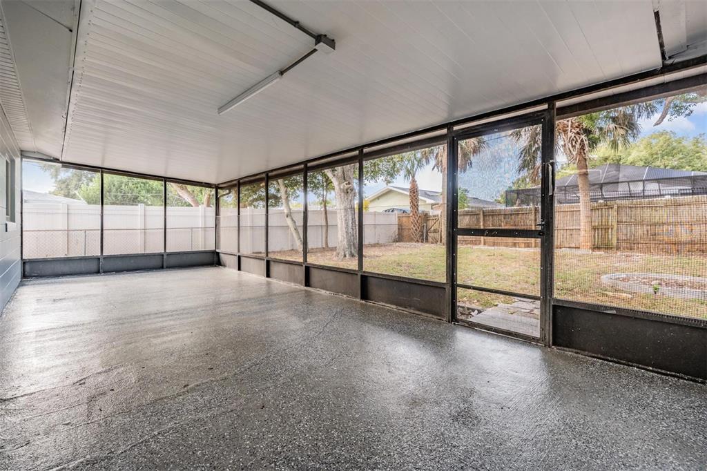 6472 113th Street Seminole, FL 33772 - Photo 29 of 36 a view of an empty room with a large window