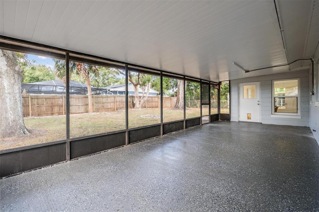 6472 113th Street Seminole, FL 33772 - Photo 30 of 36 a view of a big room with large windows