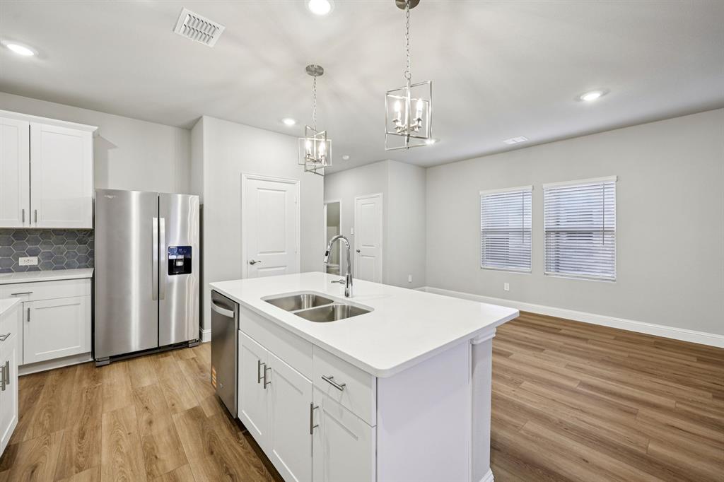 1620 Arches Road Anna, TX 75409 - Photo 4 of 40 Photo is not of the actual home, but is an inspirational photo of builder’s model home and may depict options, furnishings, and/or decorator features that are not included.