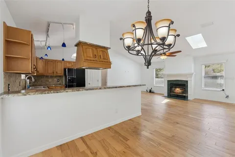 a view of a livingroom with wooden floor