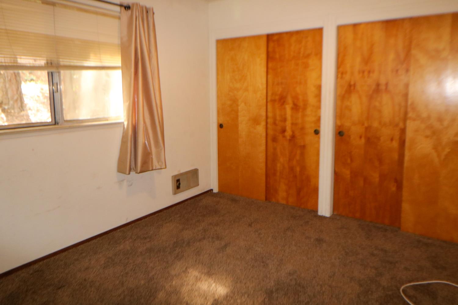 1536 Meadowview Road Arnold, CA 95223 - Photo 14 of 22 a view of an empty room with a window