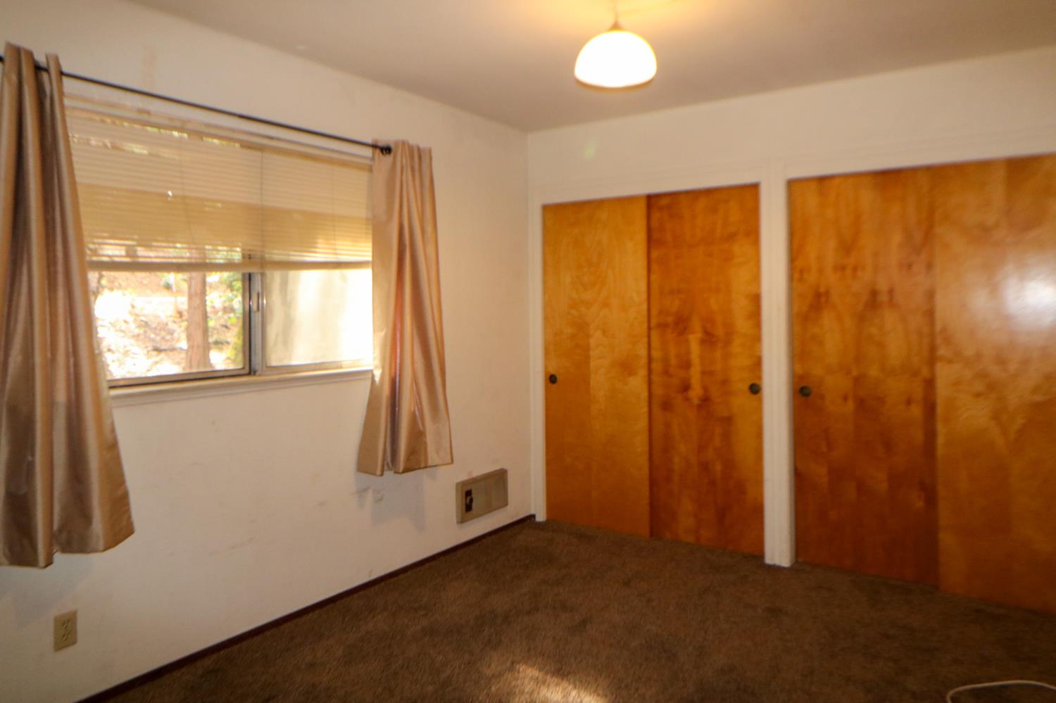 1536 Meadowview Road Arnold, CA 95223 - Photo 15 of 22 a view of an empty room with a window