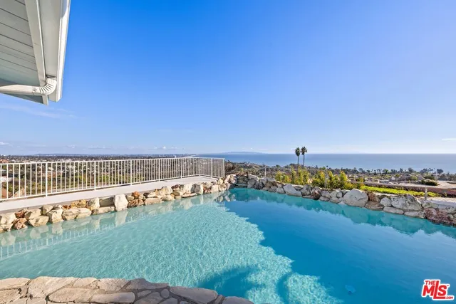 a view of an ocean and building