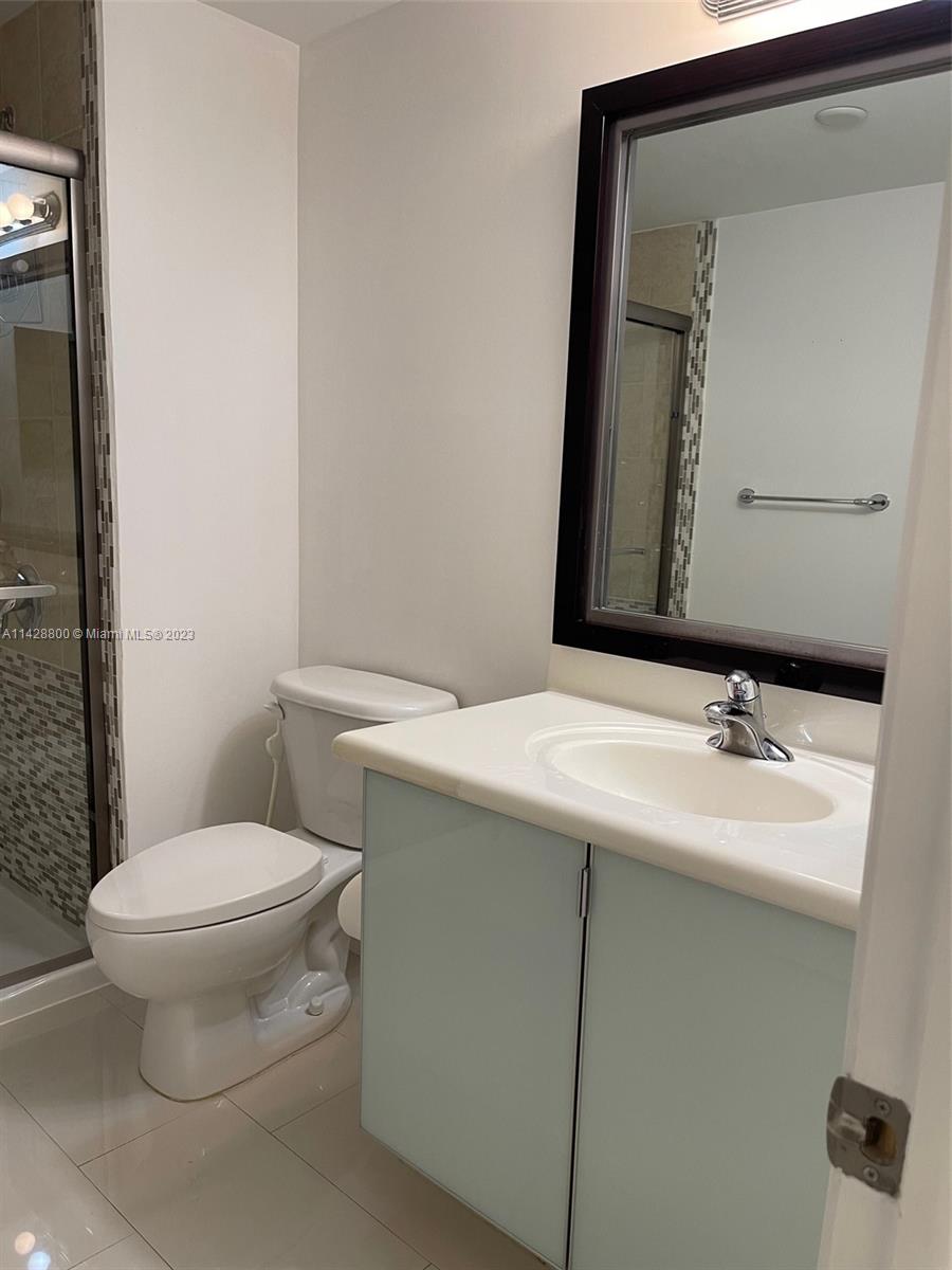 Se Colonnade at Dadeland Condominiums Miami, FL 33143 - Photo 24 of 32 a bathroom with a sink and a toilet