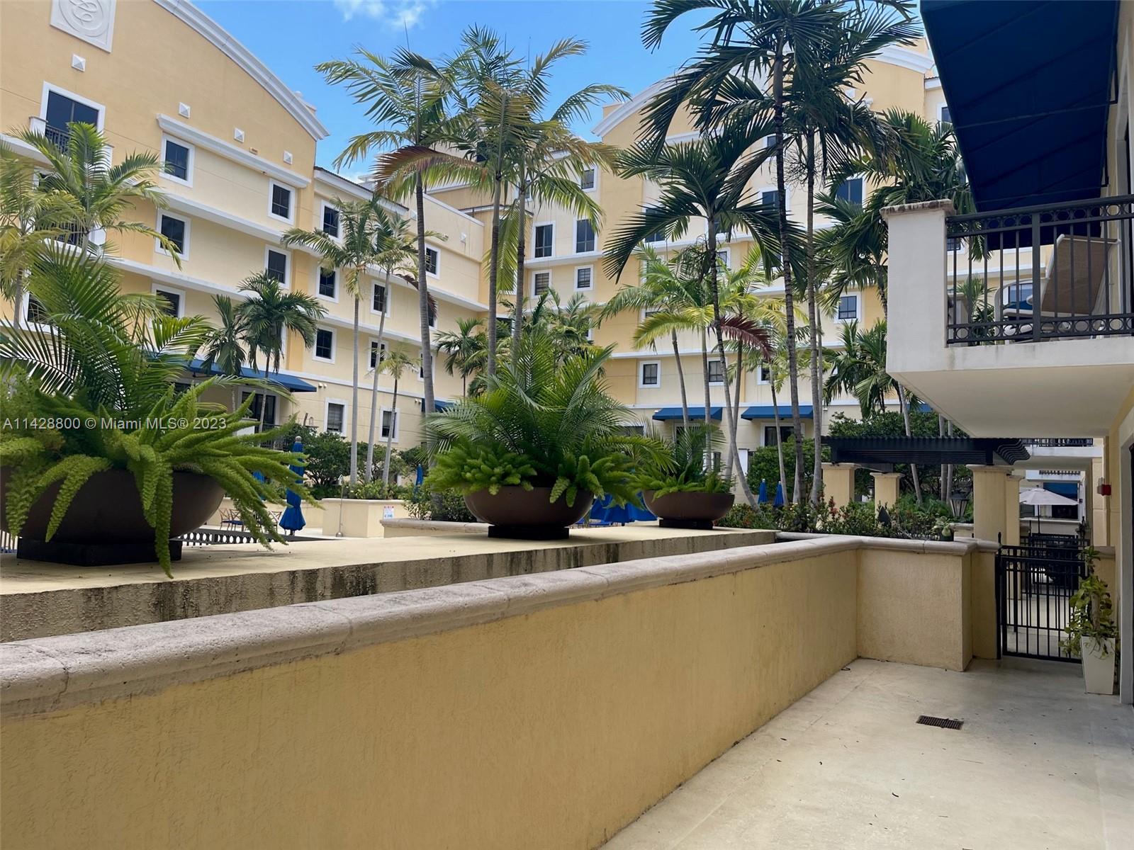 Se Colonnade at Dadeland Condominiums Miami, FL 33143 - Photo 26 of 32 a view of building with cars parked