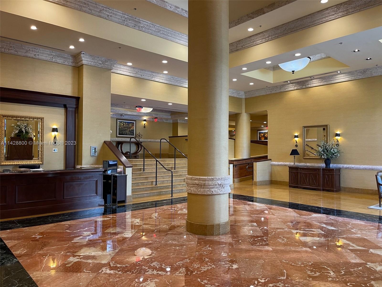 Se Colonnade at Dadeland Condominiums Miami, FL 33143 - Photo 4 of 32 a view of a lobby with black carpet