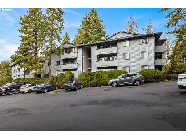 a view of a car park in front of house
