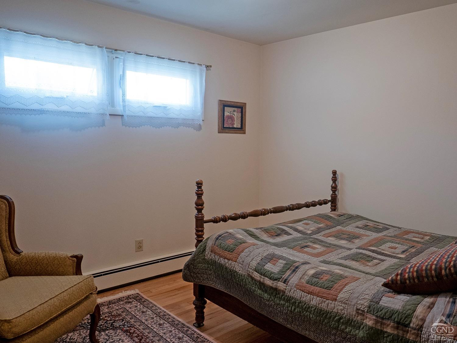 44 Benner Road Red Hook, NY 12571 - Photo 11 of 22 a bedroom with a bed and window