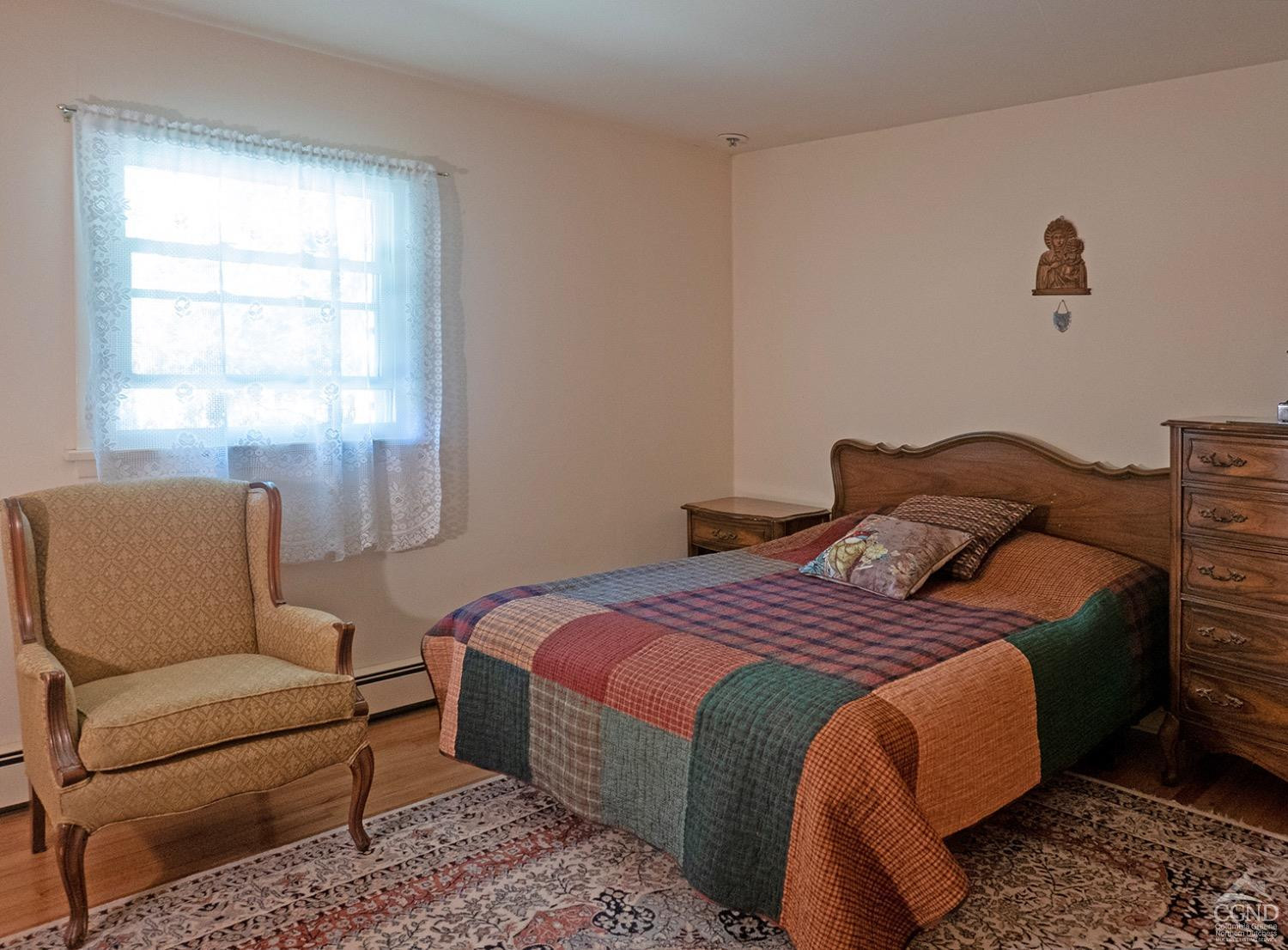 44 Benner Road Red Hook, NY 12571 - Photo 8 of 22 a bedroom with a bed and a couch