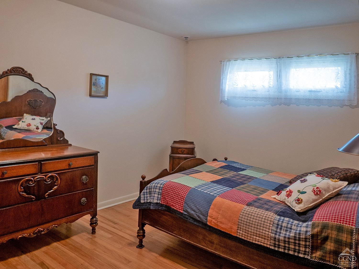 44 Benner Road Red Hook, NY 12571 - Photo 10 of 22 a bedroom with a bed and dresser