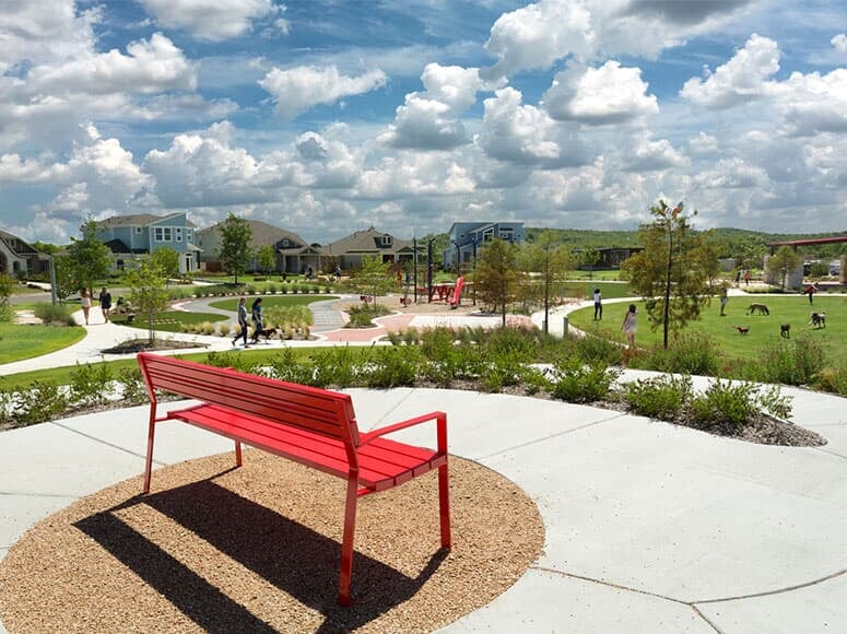 8810 Marmoset Way Austin, TX 78744 - Photo 14 of 19 a park view with a bench in a garden