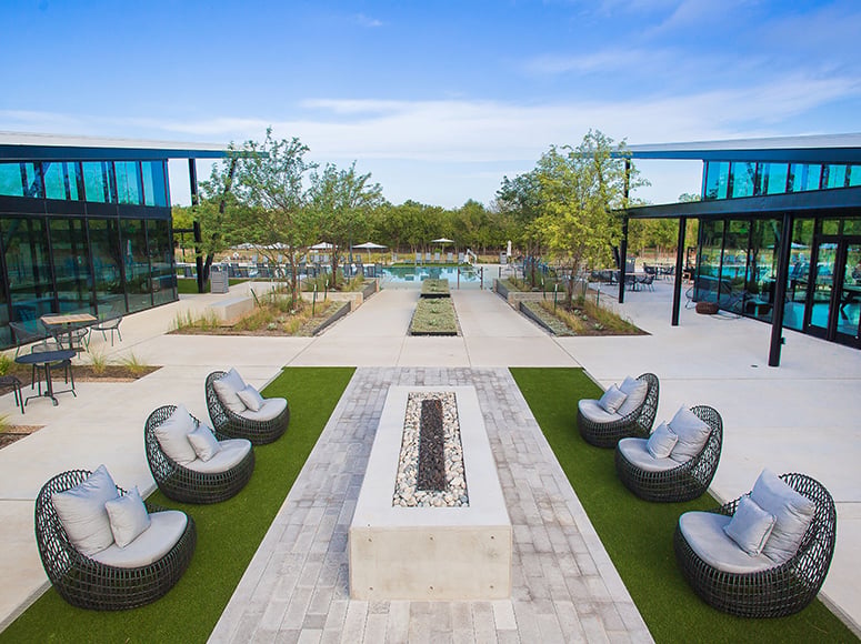 8810 Marmoset Way Austin, TX 78744 - Photo 16 of 19 a view of a swimming pool with outdoor seating space
