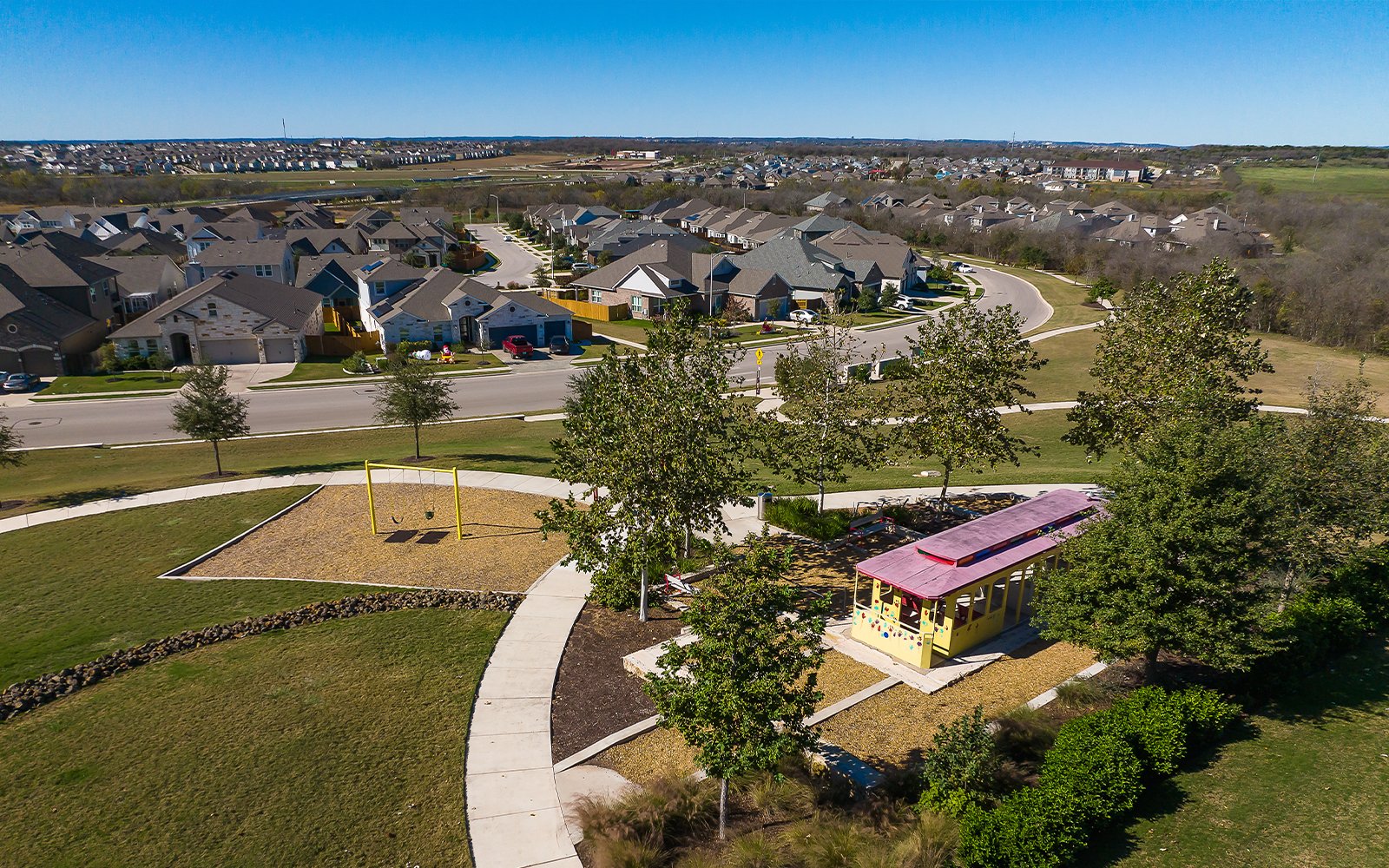 8810 Marmoset Way Austin, TX 78744 - Photo 18 of 19 an aerial view of a house with a yard