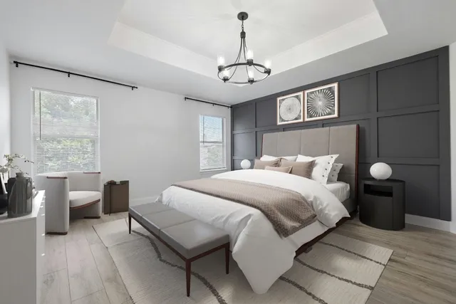 a bedroom with bed and window