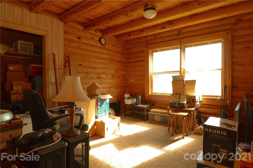 687 John Shehan Road Tryon, NC 28782 - Photo 13 of 20 a living room with furniture and a window