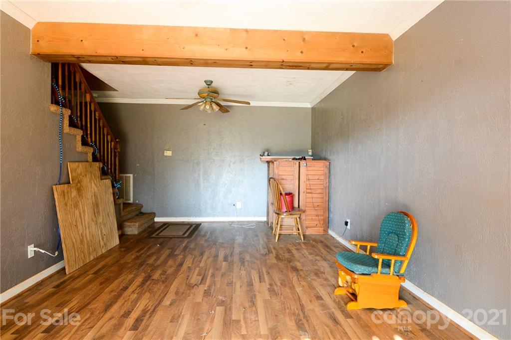 687 John Shehan Road Tryon, NC 28782 - Photo 15 of 20 wooden floor in a hall with a window