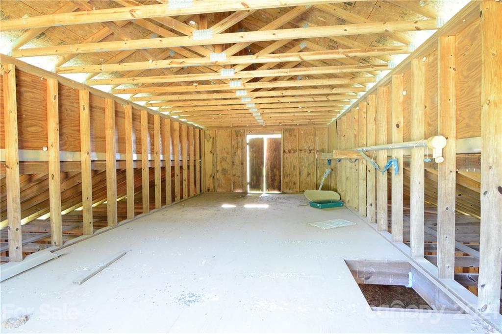 687 John Shehan Road Tryon, NC 28782 - Photo 20 of 20 a view of a porch with wooden walls