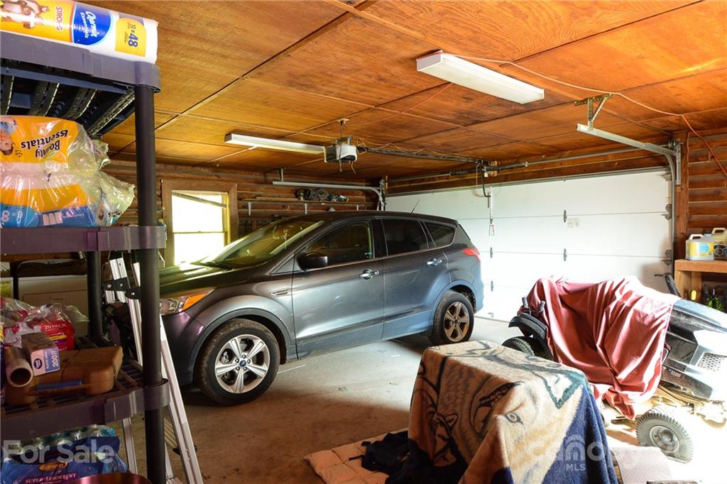 687 John Shehan Road Tryon, NC 28782 - Photo 7 of 20 a view of a car in a garage