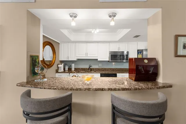 a view of a livingroom with furniture and window