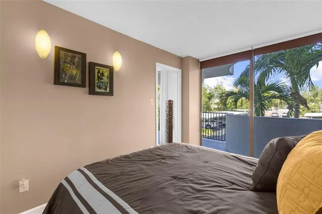 a bedroom with a bed and a walk in closet