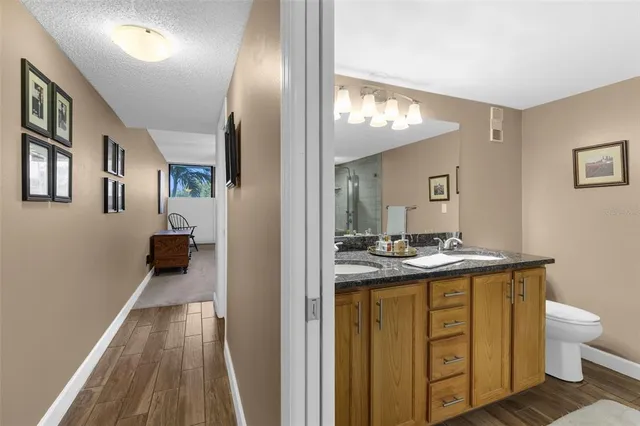 a bathroom with a shower and a sink