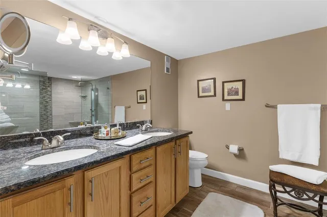 a bedroom with a bed and dresser