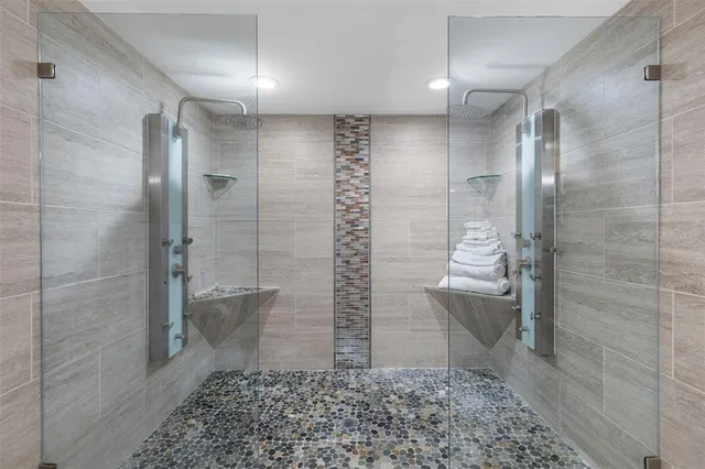 a view of a lake with palm trees