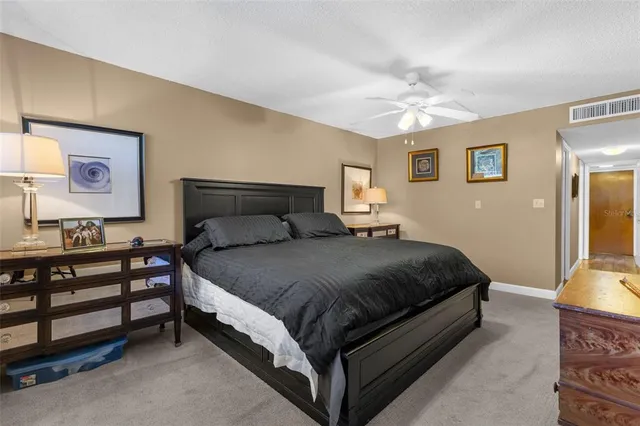 a view of a chairs and table in the balcony