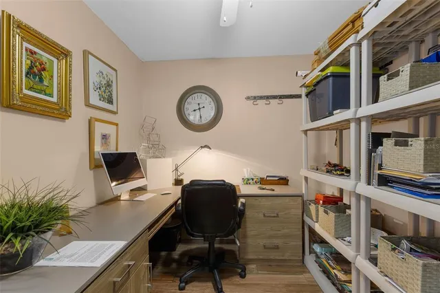 a view of a lake with couches in front of house