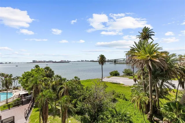 a view of a garden with an outdoor seating