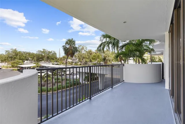 a living room with furniture and a clock