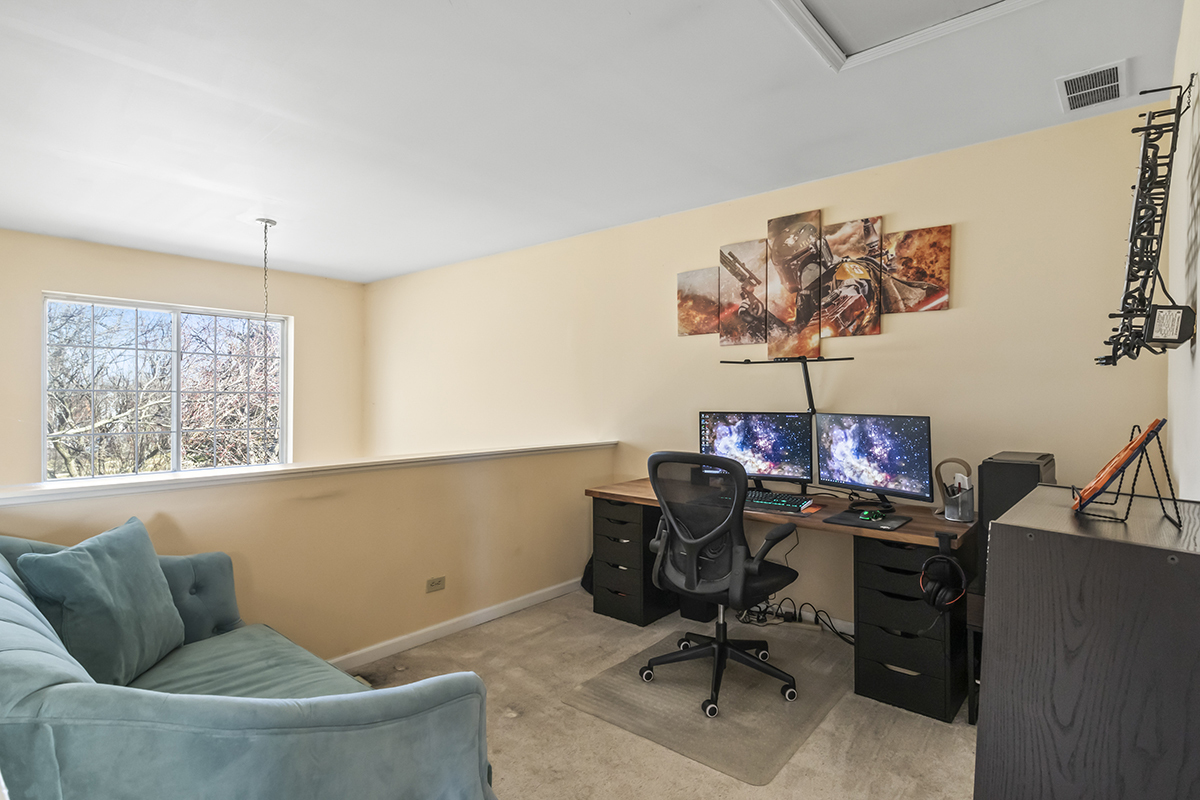 2280 Briar Court Hoffman Estates, IL 60169 - Photo 19 of 36 a view of a workspace with furniture and a window