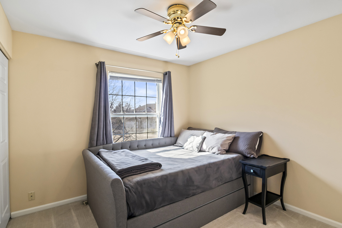 2280 Briar Court Hoffman Estates, IL 60169 - Photo 24 of 36 a bedroom with a bed and a window