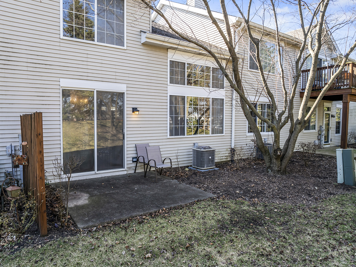 2280 Briar Court Hoffman Estates, IL 60169 - Photo 28 of 36 a front view of a house with a yard