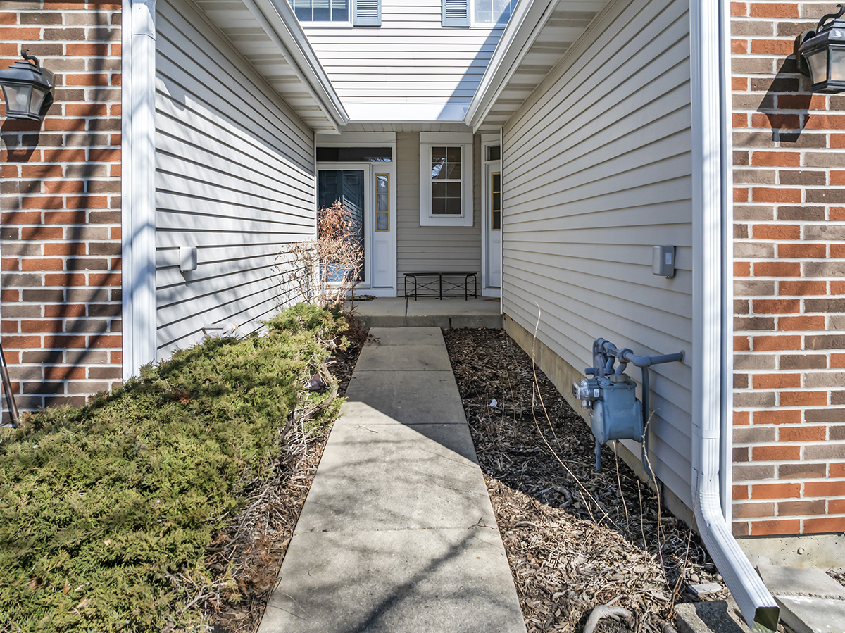 2280 Briar Court Hoffman Estates, IL 60169 - Photo 3 of 36 a view of a house with a yard