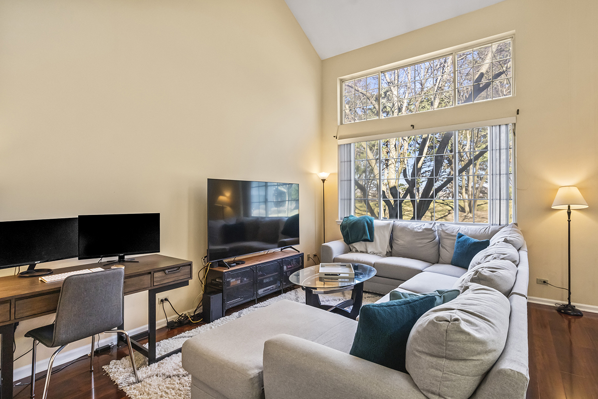 2280 Briar Court Hoffman Estates, IL 60169 - Photo 6 of 36 a living room with furniture and a flat screen tv