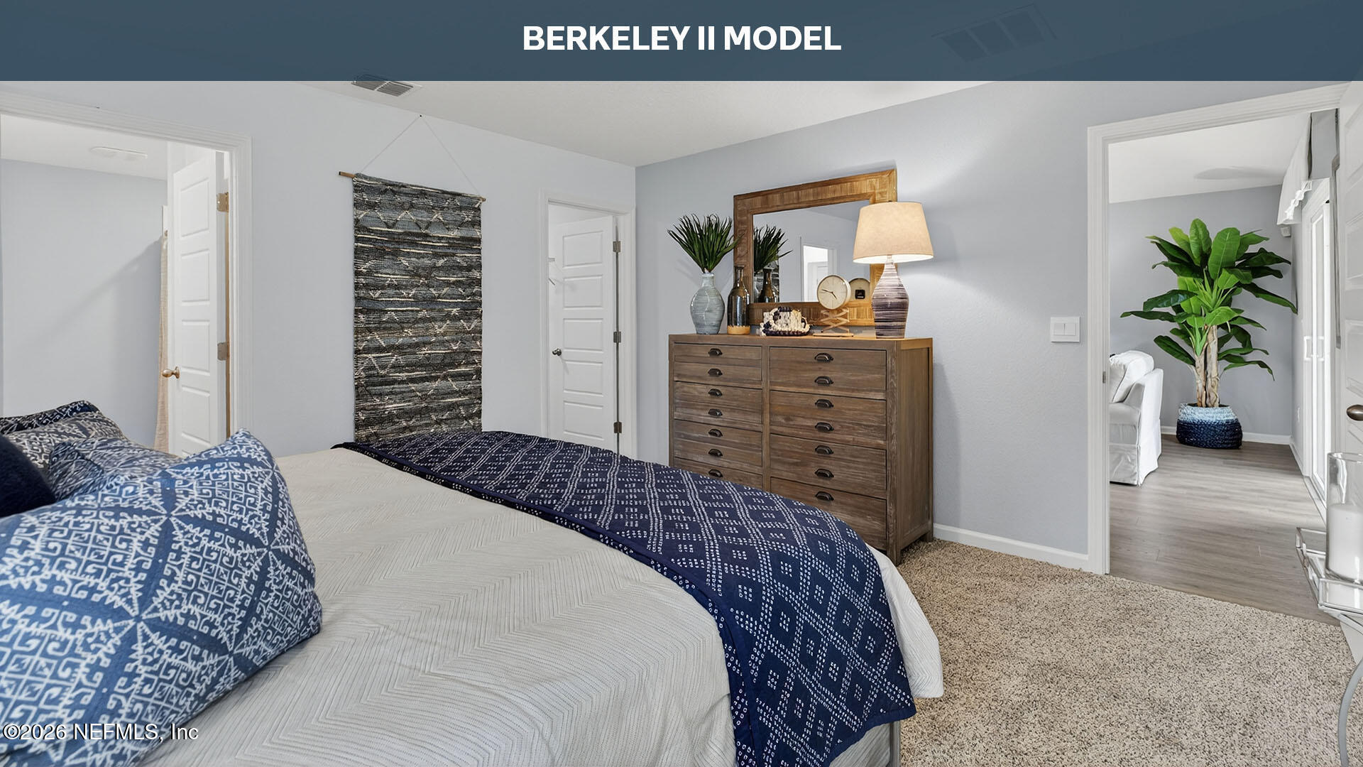 12413 Russian Olive Road Jacksonville, FL 32218 - Photo 15 of 52 a bedroom with a bed and a dresser