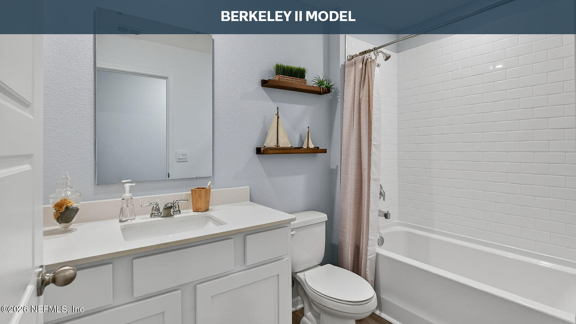 12413 Russian Olive Road Jacksonville, FL 32218 - Photo 22 of 52 a bathroom with a toilet sink and mirror