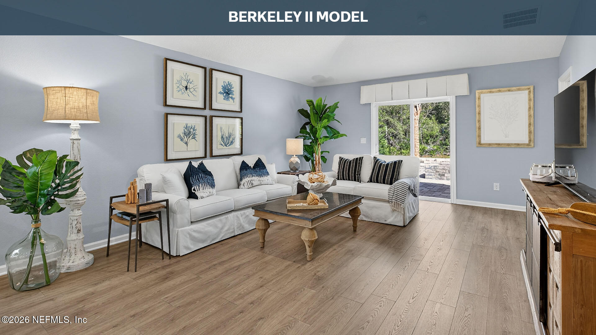 12413 Russian Olive Road Jacksonville, FL 32218 - Photo 10 of 52 a living room with furniture and a large window