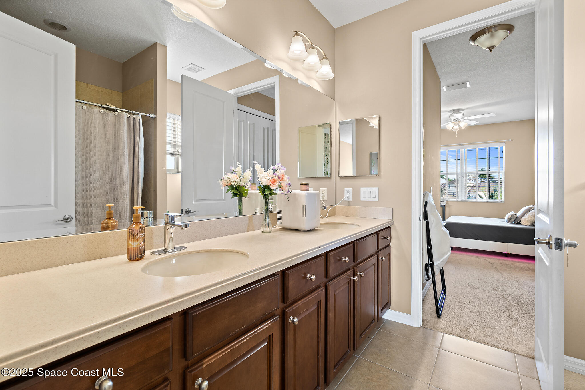 3857 Hollisten Circle Melbourne, FL 32940 - Photo 7 of 40 Jack and Jill Bathroom