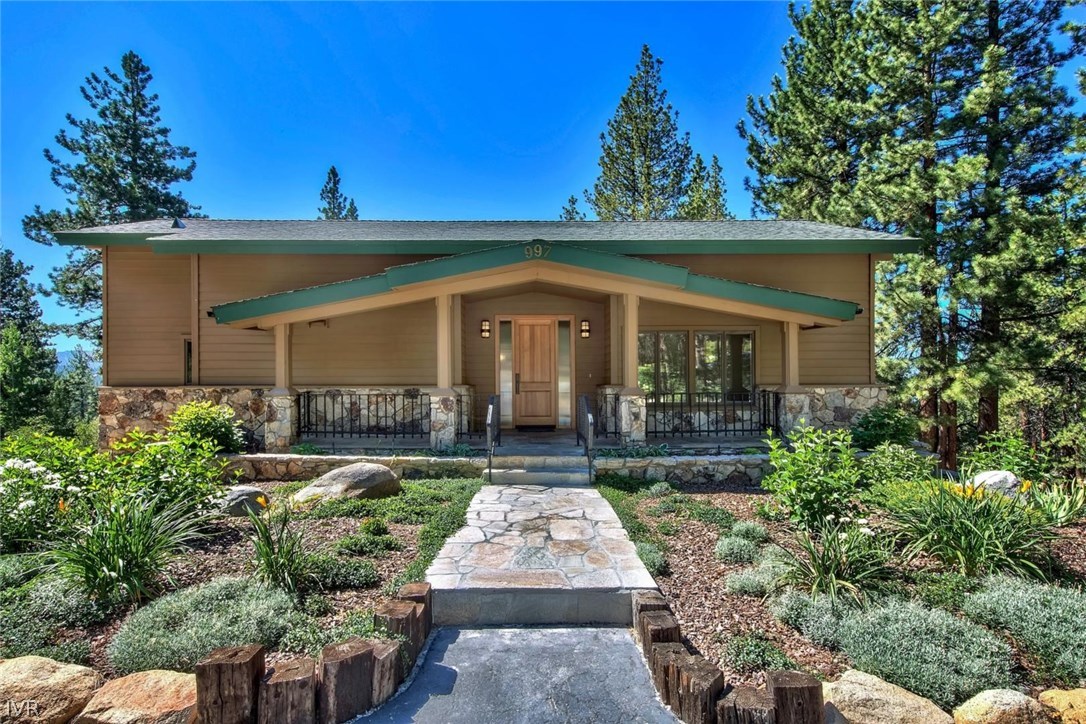 997 Apollo Way Incline Village, NV 89451 - Photo 4 of 35 front view of a house with a yard